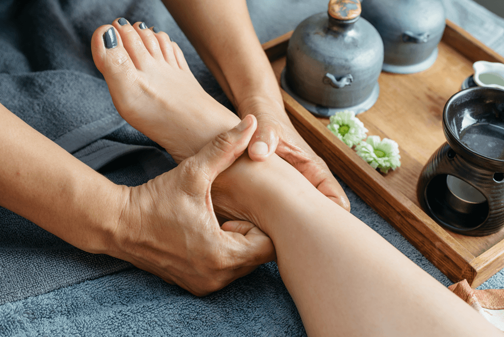 therapists doing Reflexology massage